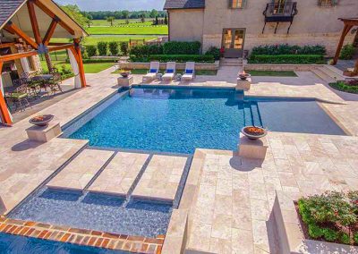 Ivory travertine outdoor pool tiles and pool coping